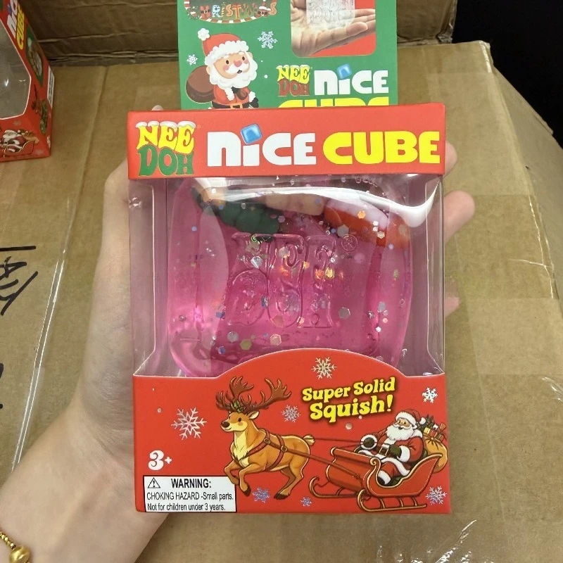 New Needoh Christmas glow-in-the-dark box pinch music Christmas elements filled with maltose pinch music toys.