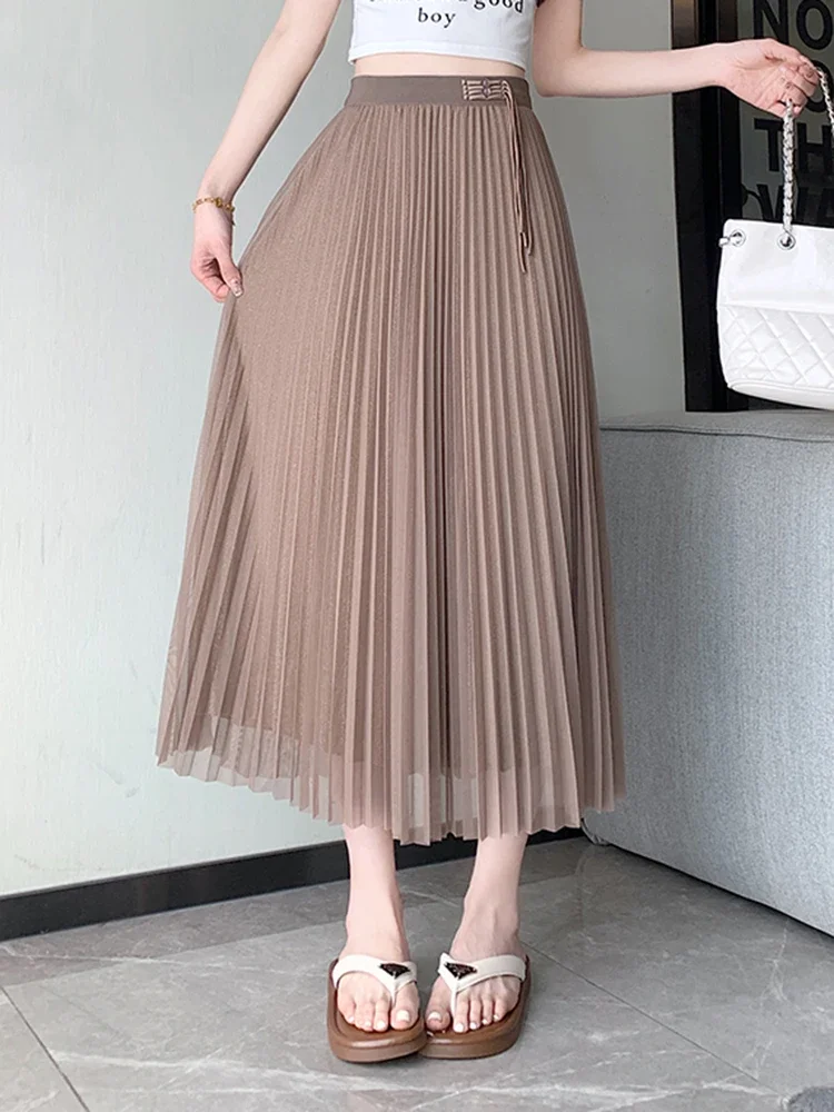 

New Casual Elastic High Waist Loose Solid Color Women Midi Skirts Summer Chic Tassels Fashion Loose Simple Elegant Female Skirts