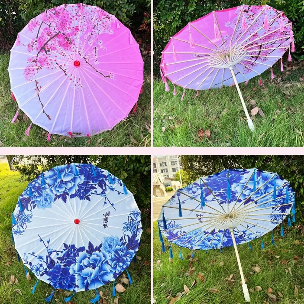 Ombrello da 56 cm in tessuto di seta stile antico cinese Ombrello da ballo con nappa 10 colori Ombrello classico in stile giapponese