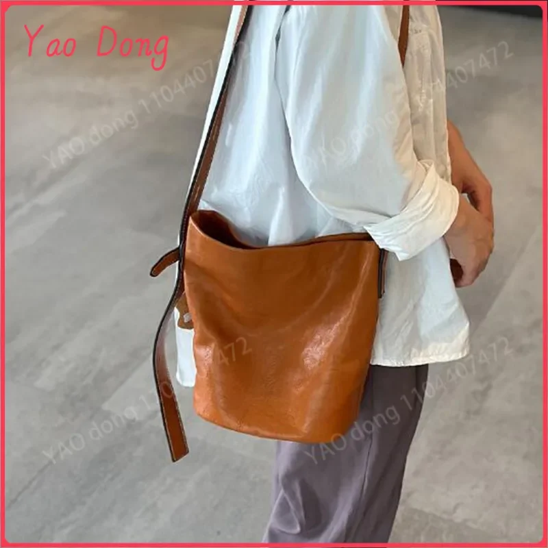 Yao Dong 2024 New adjustable shoulder strap Korean leather bucket bag women's head layer cowhide retro casual crossbody bag