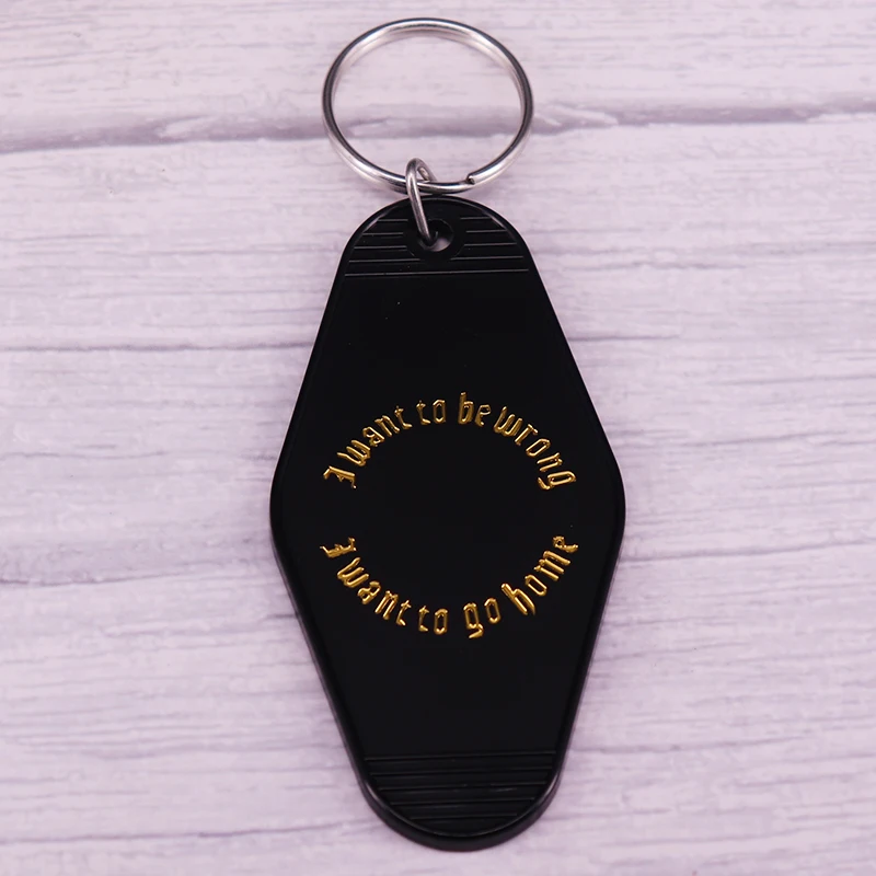 I Want to Go Home Black Motel Keychain