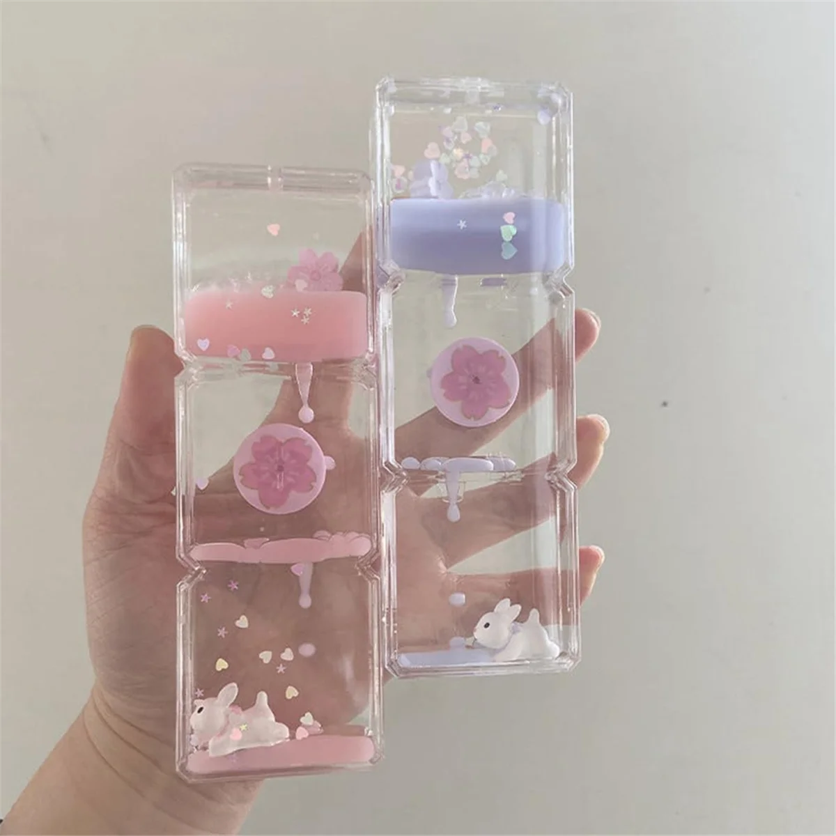 Il nuovo mini clessidra liquida dei cartoni animati, clessidra per bambini, giocattolo clessidra dei cartoni animati, decorazione desktop per ufficio/casa rosa