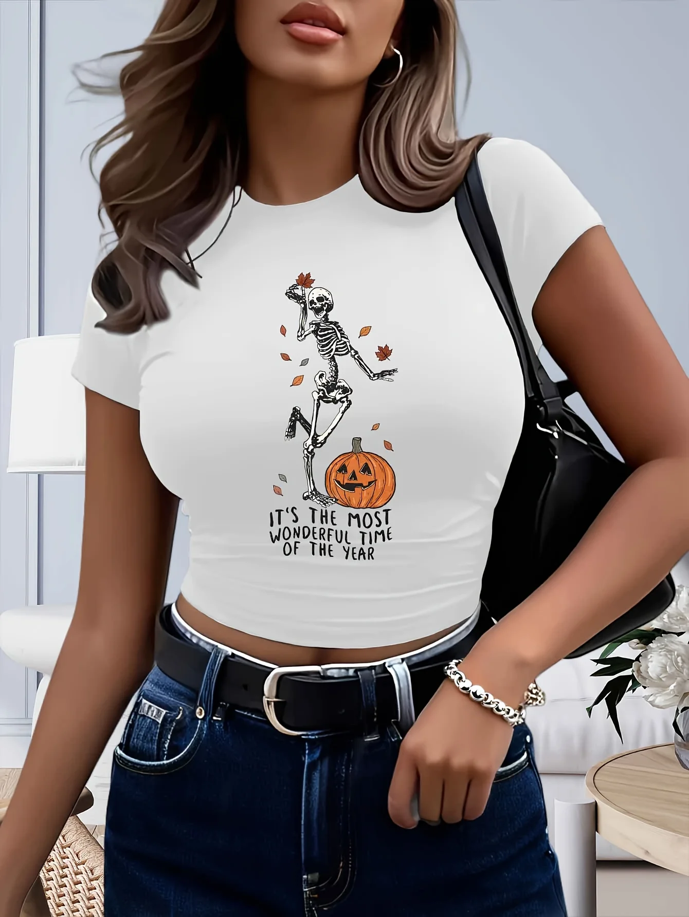 Women's Halloween Skeleton and Jack-O'-Lantern Graphic Crop Tops Short Sleeve Crop T Shirt with Bat and Spider Web Design Print