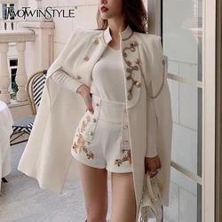 TWOTWINSTYLE Temperament Solid Coats For Women Stand Collar Cloak Sleeve Patchwork Button Elegant Coat Female Fashion Clothes