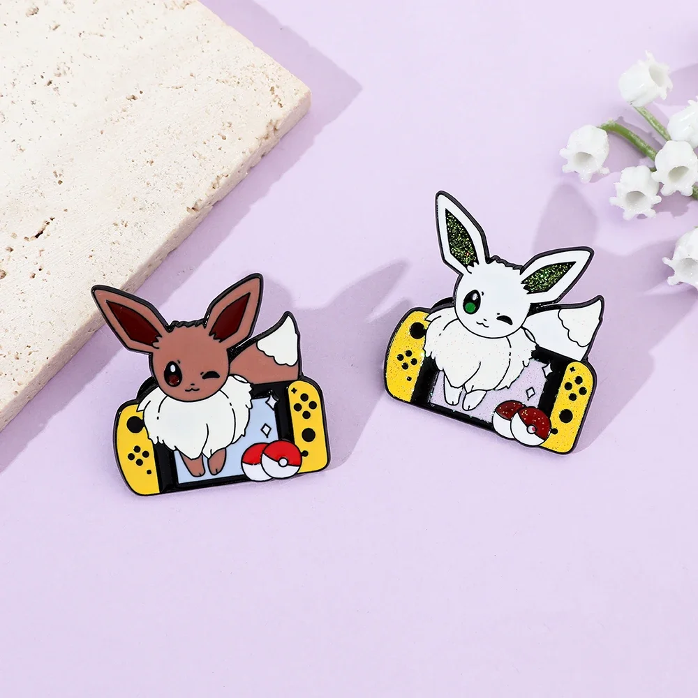2 Pcs Anime Elf Cartoon Brooch Creative Eevee Game Console Enamel Pin Metal Badge Jewelry Clothing Backpack Accessories Gift view 2