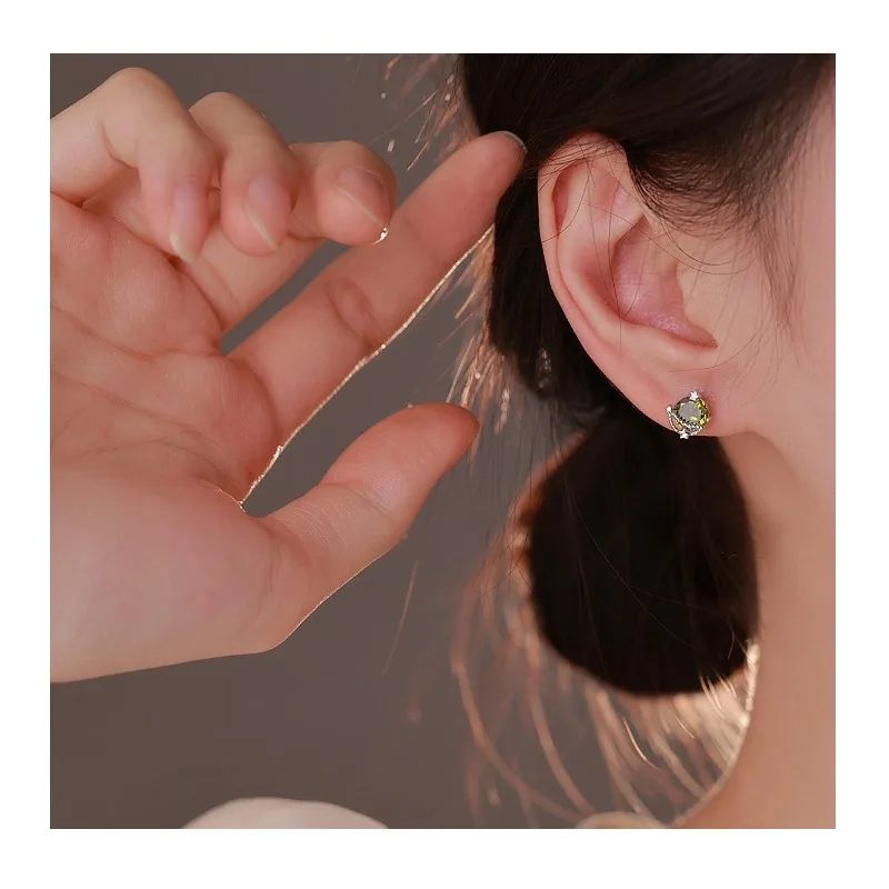 

New Saturn Stud Earrings Women's Simple and Small Bright Star Earrings Green Zircon Small Planet Earrings Tide