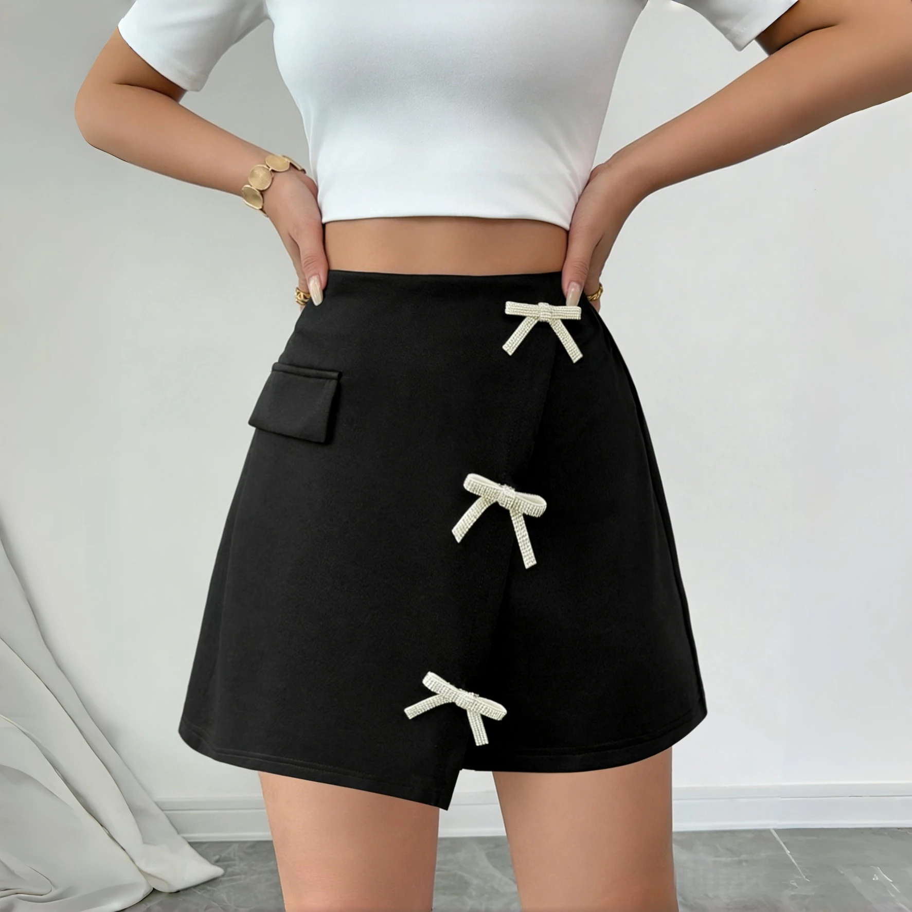

Женские асимметричные шорты-юбка черного цвета с бантом из страз, модные повседневные универсальные шорты для весны и лета, для ежедневных поездок на работу
