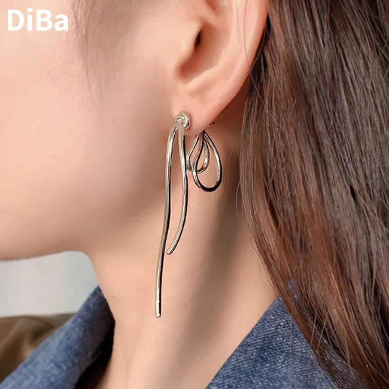 

Modern Jewelry Vintage Temperament Long Metal Bowknot Earrings For Women Party Gifts Simply Design 2024 Trend New Accessories