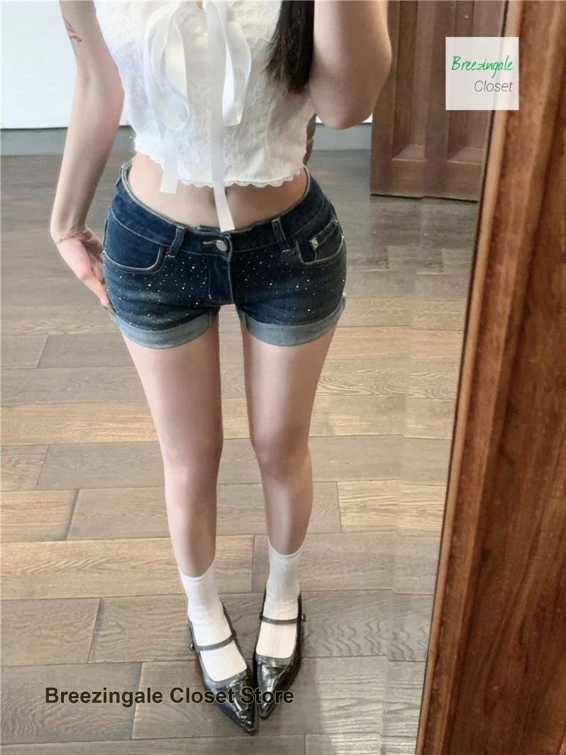 American retro fashion temperament rhinestone hemmed denim shorts female summer spice girl sexy low waist elastic bag hip pants