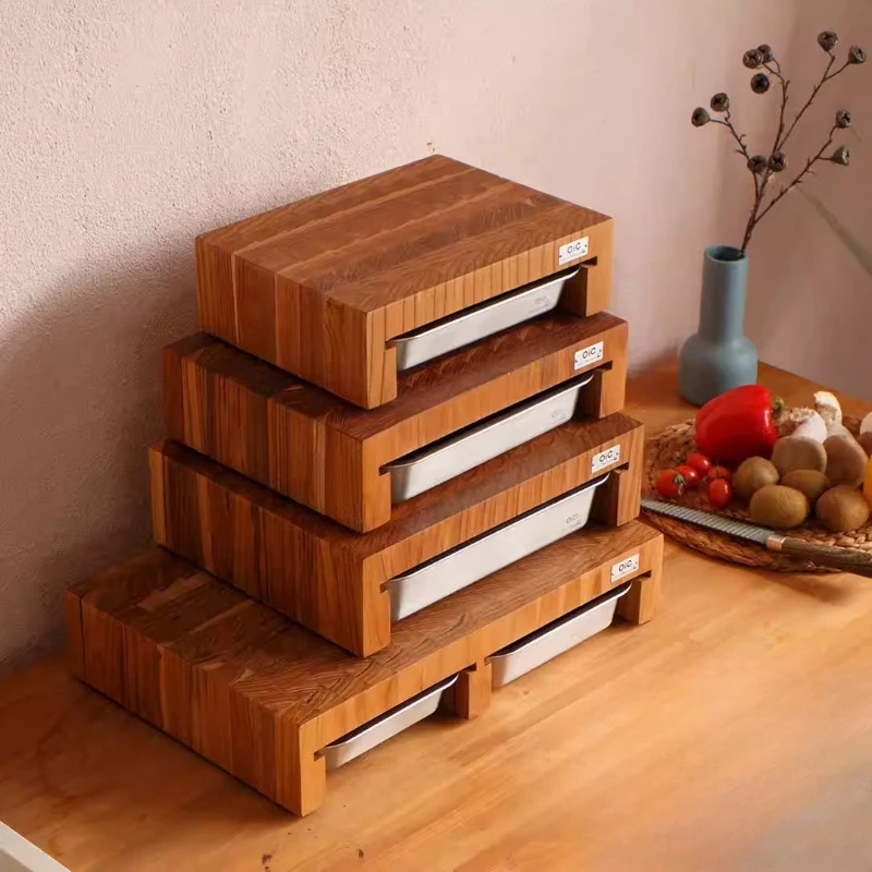 

Indonesian teak combination cutting board with vegetable preparation stainless steel storage box