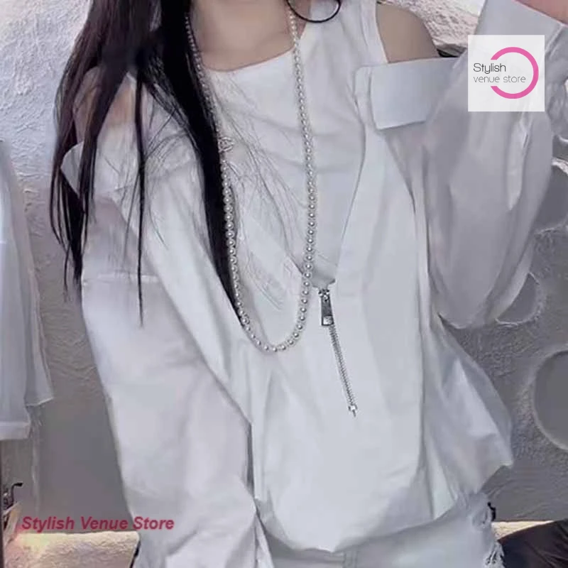 

Korean round neck stitching fake two long-sleeved shirts women's spring and summer new fashion design relaxed casual Joker tops.