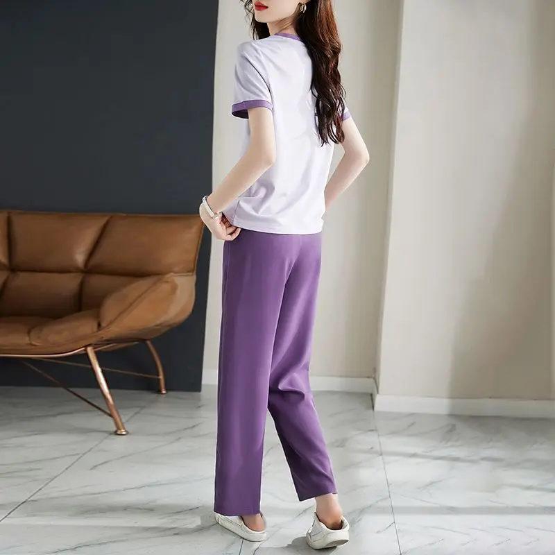 Ensemble deux pièces décontracté violet pour femme, col rond, manches courtes, long pantalon, look slim, polyvalent, été, nouveau style, 2023