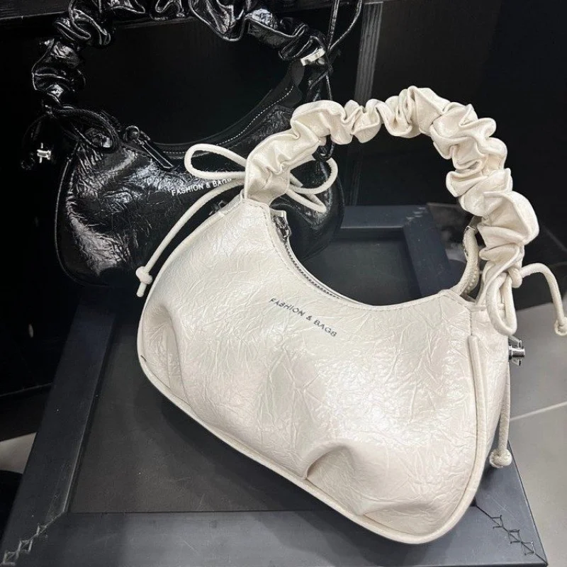 

Популярная классическая элегантная большая сумка для женщин, изготовленная из кожи и винтажный стиль.