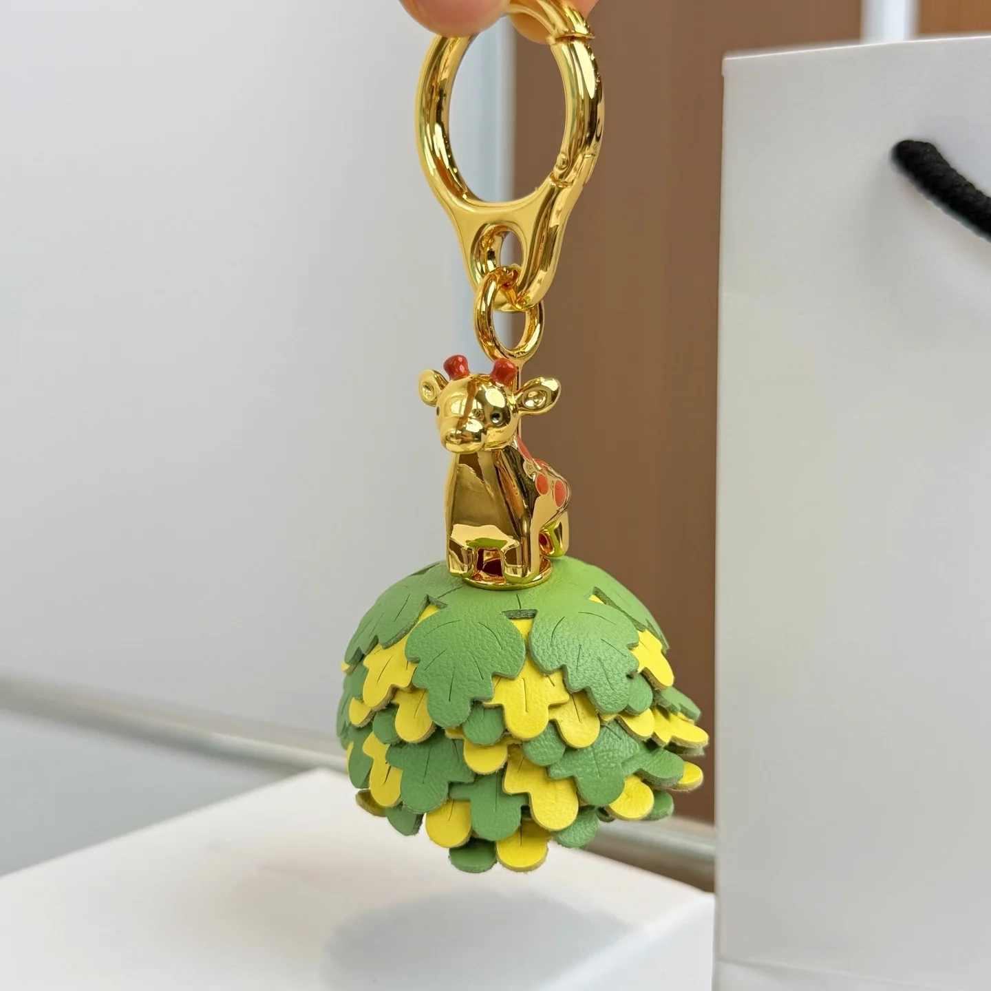 Fashionable mini animal image leather flower tassel metal keychain multi-color fashionable handbag backpack pendant decoration
