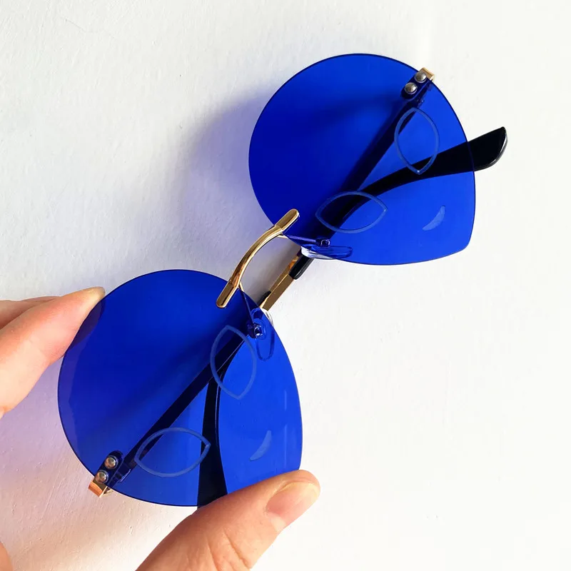 

Hip Hop Sun Glasses Personality Alien Anti-UV Spectacles Funny Eyeglasses Rimless Google Blue Color Sunglasses