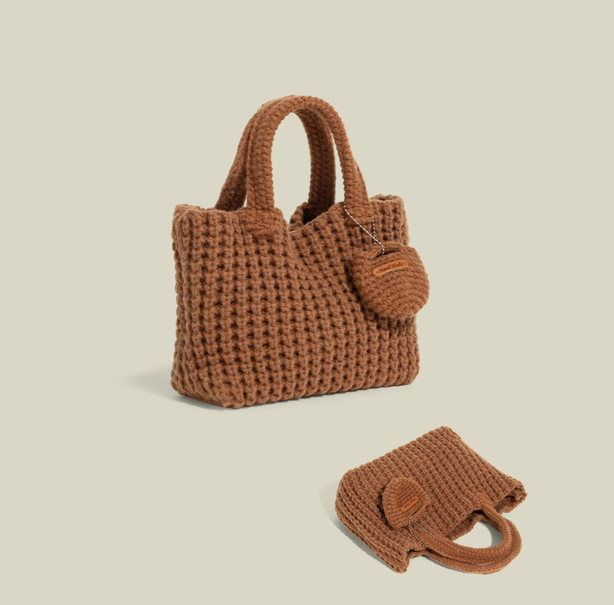 Borsa a mano lavorata a maglia in stile coreano Nuova borsa leggera semplice in tinta unita Borsa quadrata morbida da donna versatile alla moda 2025