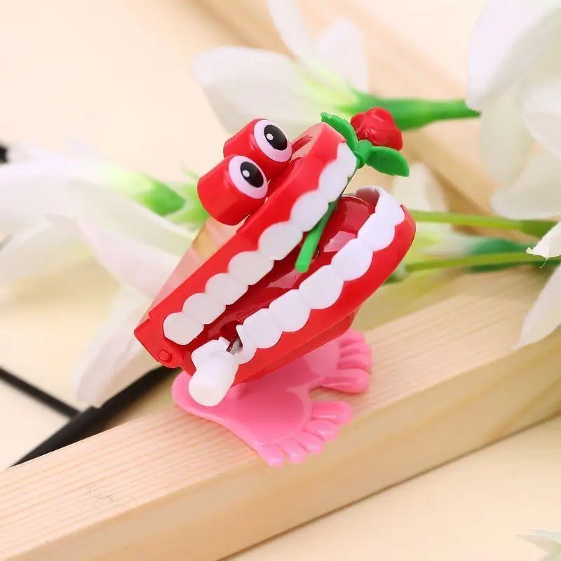 

R1WF Clockwork Jumping Denture Rose Education Mechanical Desktop Decoration