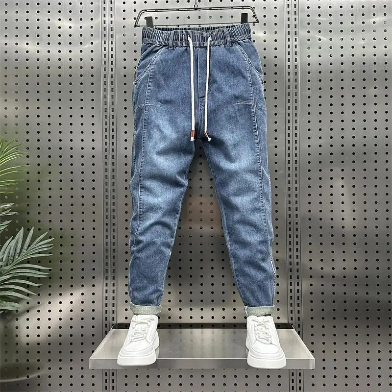 Fashion mewah longgar pinggang elastis Denim Harem Jeans pria pakaian desainer longgar Jogger Celana kasual biru untuk pria