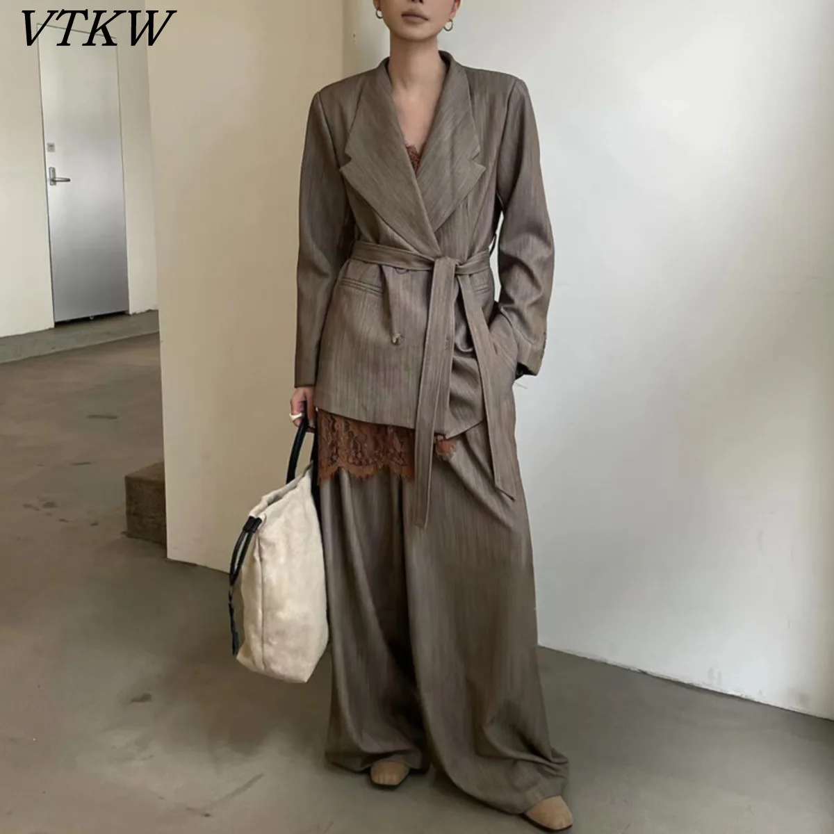 

VTKW 2026 New Women Two Piece Suit Textured Blazer Shawl Collar Self Tie Waist Double Breasted Wide Leg Trousers Casual Outfit