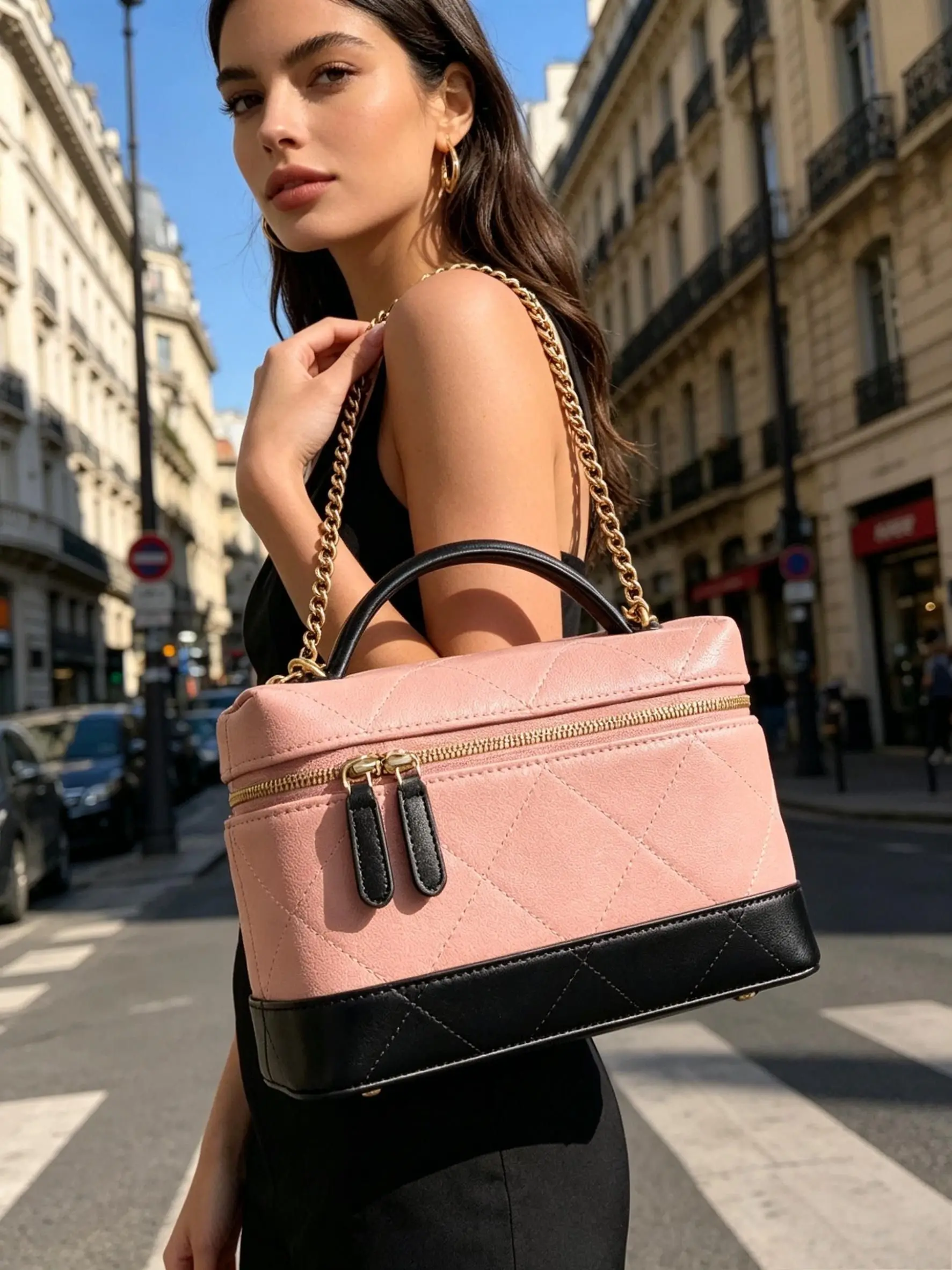 Two-tone pink & black genuine leather quilted mini cosmetic box bag with black top handle and vintage gold chain crossbody strap.