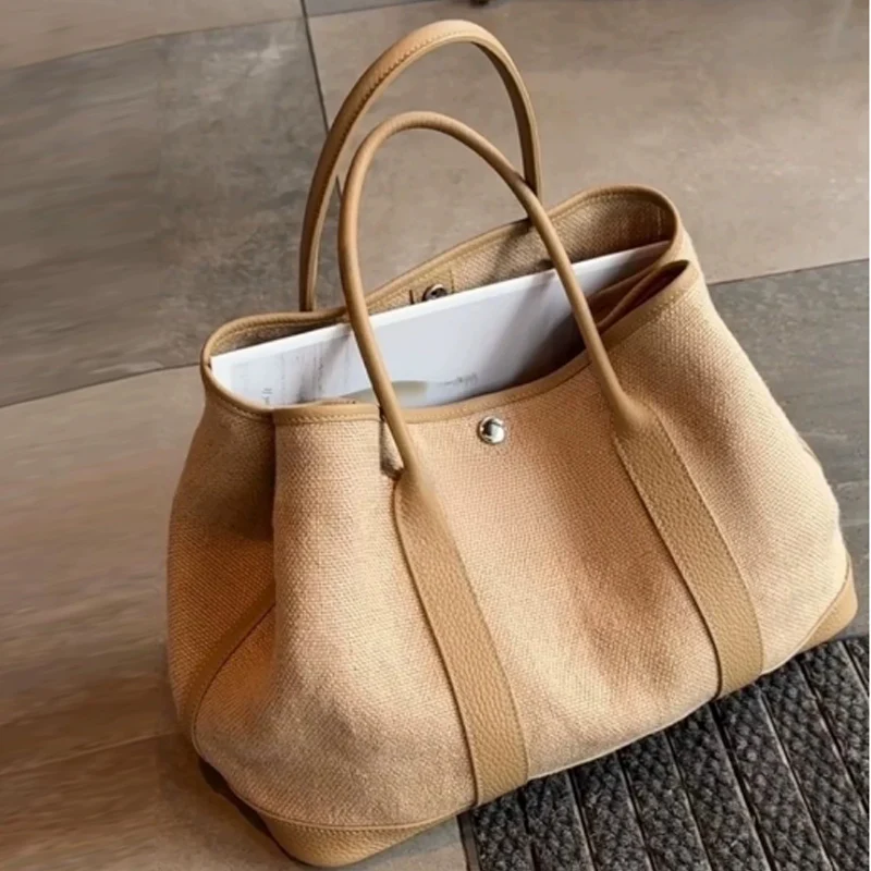 

Fashion Linen Canvas Large Capacity Tote Bag Garden Bag Women 2026 New High-end Commuting Handbag Shoulder bag
