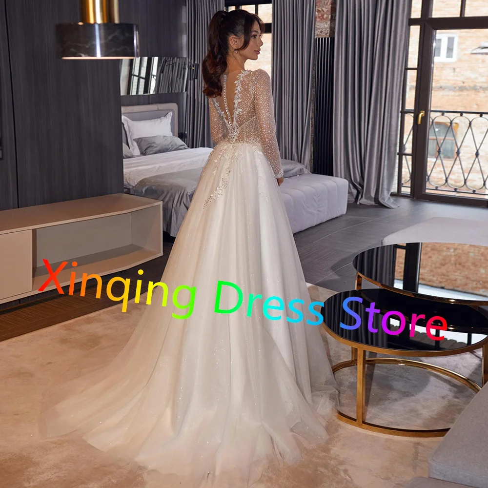 Customized Modern Tulle Wedding Dresses Sparkly Sequined Buttons Back Appliques Long Sleeves Bridal Gowns with Sweep Train Party