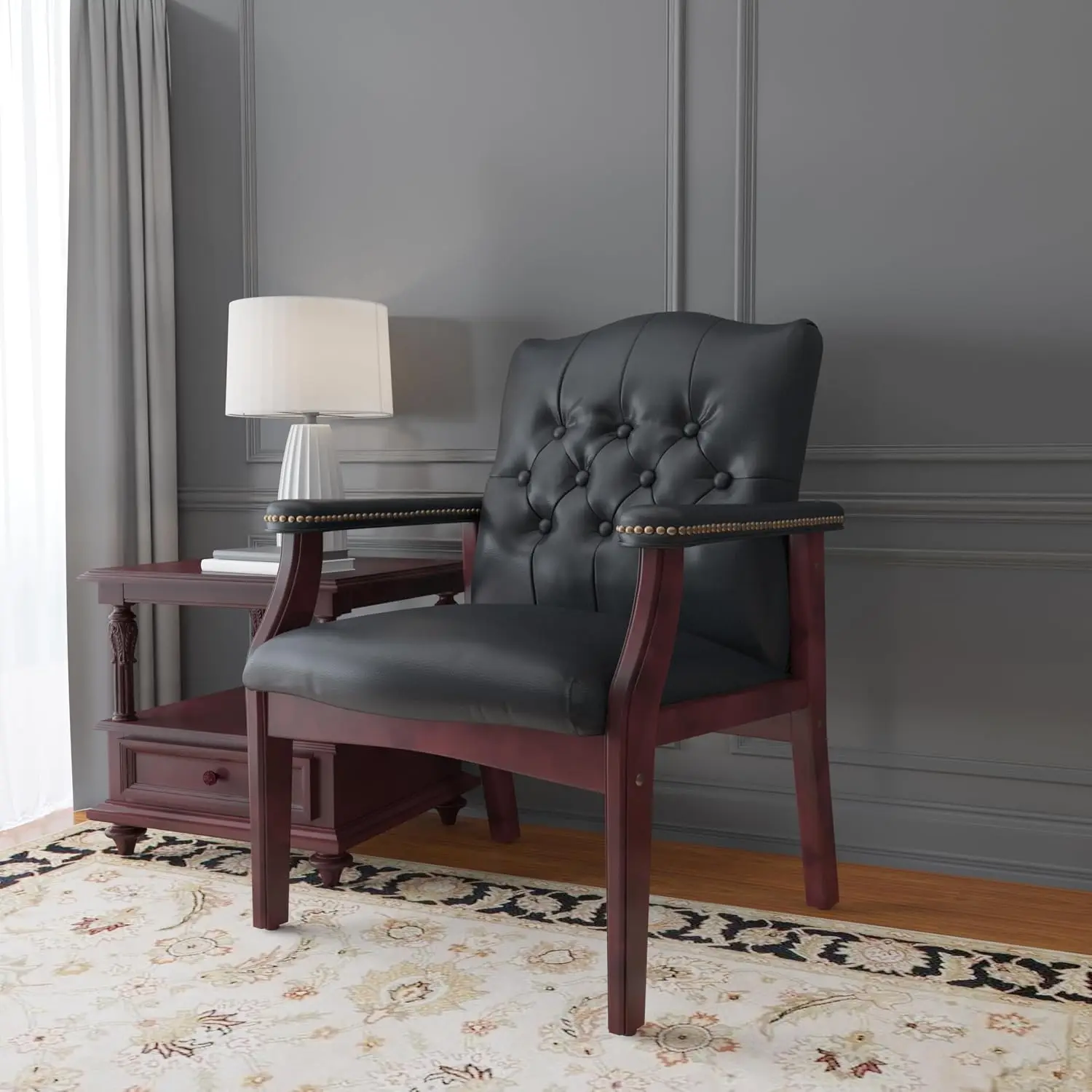 Traditional Guest Chair with Soft Black Vinyl Upholstery and Mahogany Finish Wood Base