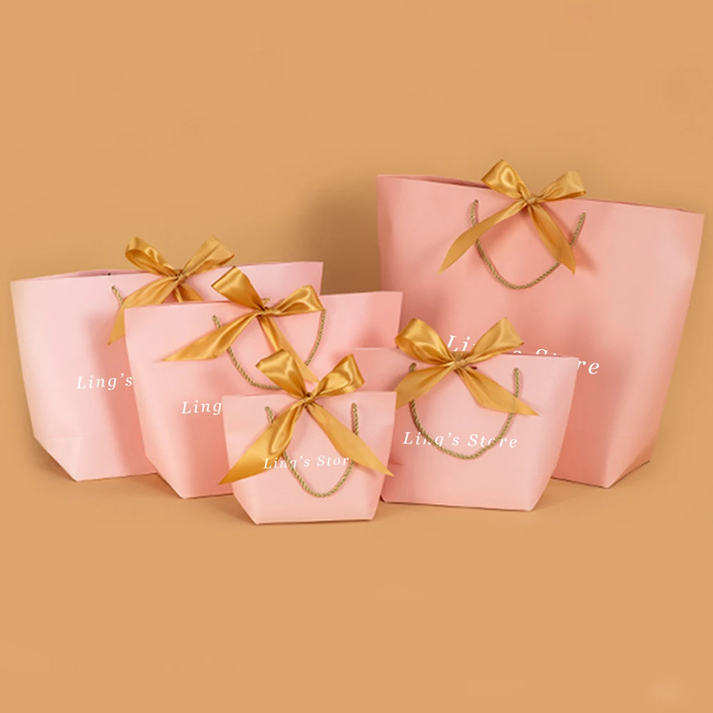 

100Pcs Custom Logo Jewelry Paper Handle Bag With Ribbon Bowknot Gift Packaging Cosmetic Perfume Shopping Travel Clothes Handbag