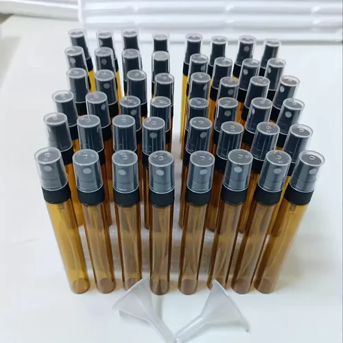 Imagen 2 del producto Venta al por mayor 48/Uds de alta calidad 10ml botella de Perfume de vidrio transparente Mini botella de Perfume para hombres y mujeres elementos esenciales de viaje