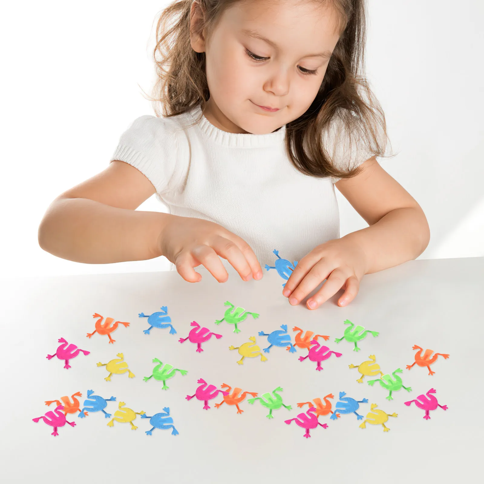 

Детская игрушка-лягушка для прыжков