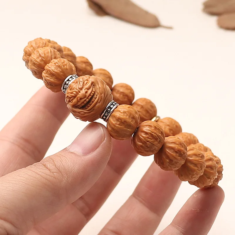 

Heaven Eye Fierce Monk Buddha Monkey Head Walnut Hand Carved Collectible Eight Facet Single Strand Bracelet Round Large Grain