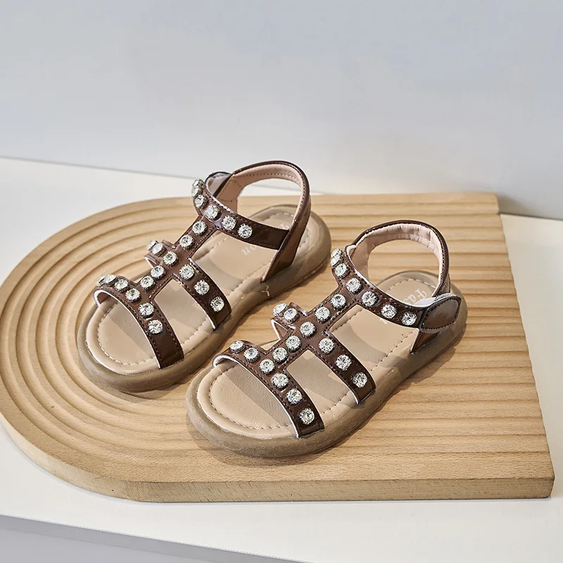 Kinderen Retro Romeinse Sandalen 2024 Gloednieuwe Koreaanse Comfortabele Zachte Zool Meisjes 'Mode Strass Strandschoenen Kinderen Zomer Flats