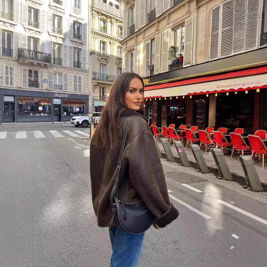 แจ็คเก็ตบอมเบอร์หนัง PU วินเทจ คอลเลคชั่นฤดูใบไม้ร่วง 2025 รุ่นใหม่สำหรับผู้หญิง ซิป ปกเสื้อแบบลาペル แขนยาว มีกระเป๋า พร้อมเข็มขัด สไตล์สตรีทแวร์ทรงหลวม