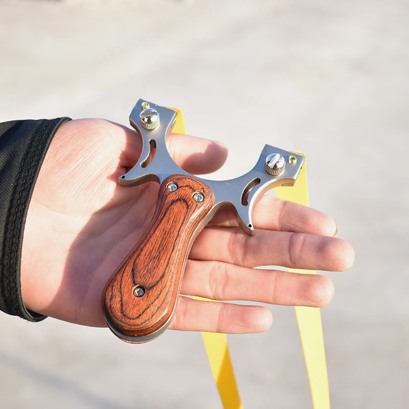 

Classic Stainless Steel Hunting Slingshot, Wooden Non-Slip Handle, Outdoor Slingshot Hunting Set, Flat Rubber Band Shooting.