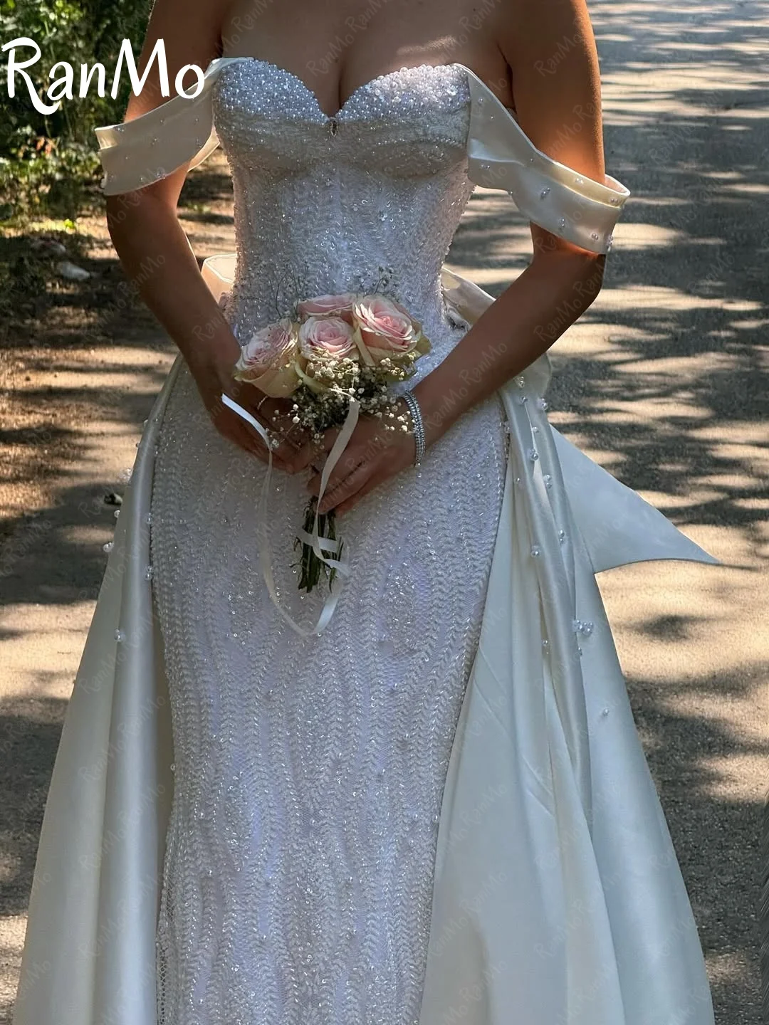 Ranmo جديد 2025 فستان زفاف فاخر على شكل قلب بدون أكتاف مطرز بفيونكة دانتيل Vestido de novia فستان زفاف لؤلؤي مشد مخصص