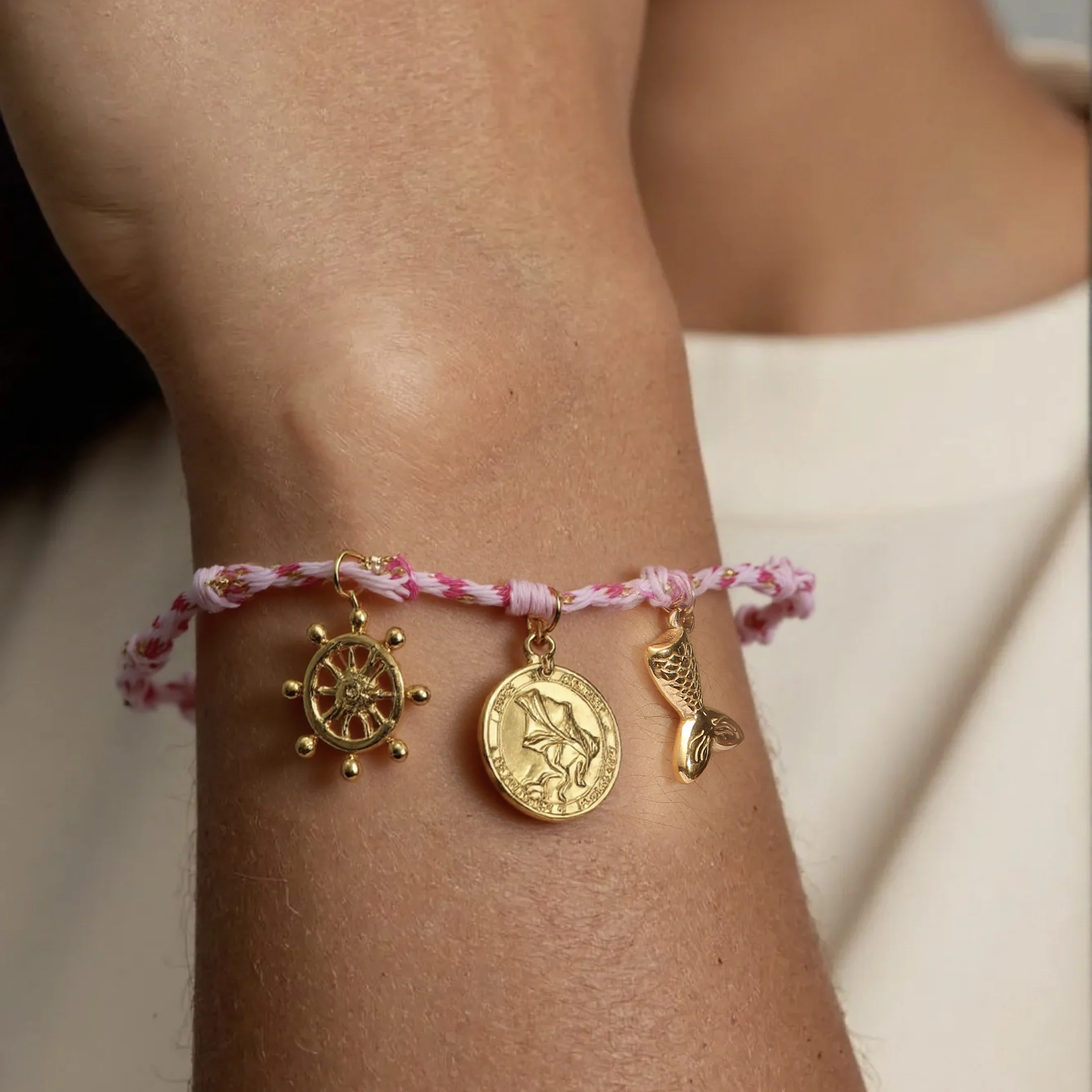 

Golden Tone Braided Cord Ocean Charm Bracelet with Mermaid Tail and Ship Wheel Pendants for Women