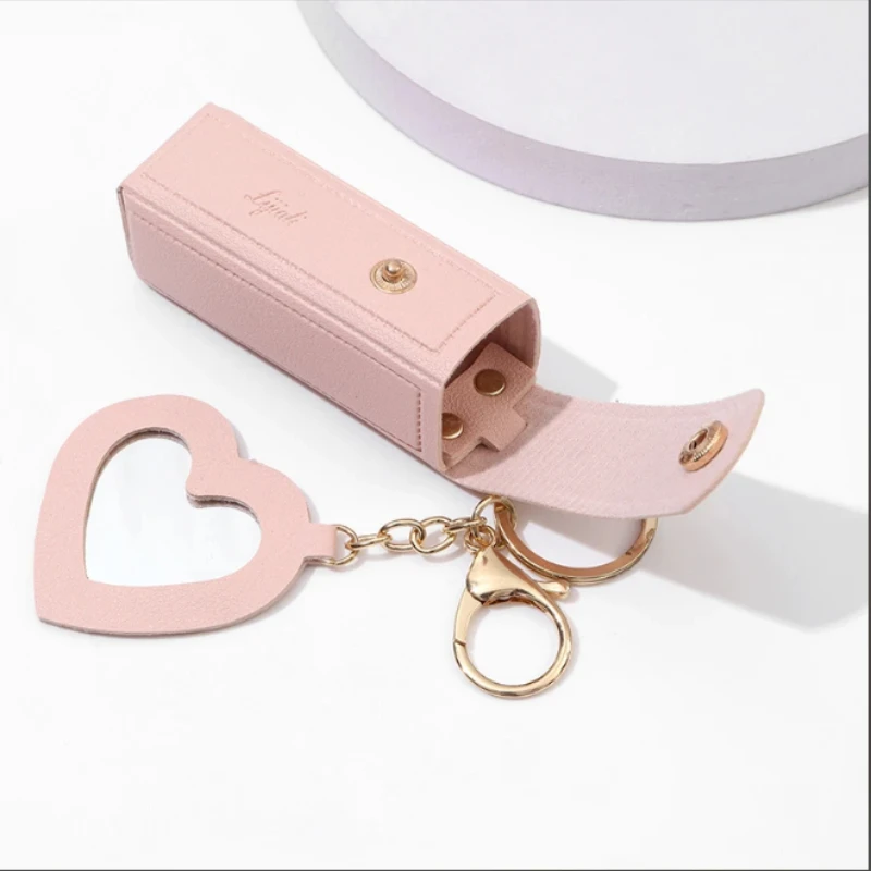 حقيبة مكياج محمولة من الجلد لأحمر الشفاه، حزمة بلسم الشفاه، حامل سلسلة مفاتيح، غطاء حماية لأحمر الشفاه مع مرآة