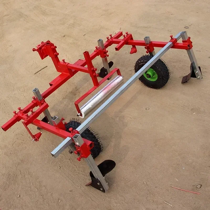 Plastic film mulching machine, agricultural machinery for use with power tillers, mulching machine, film laying machine