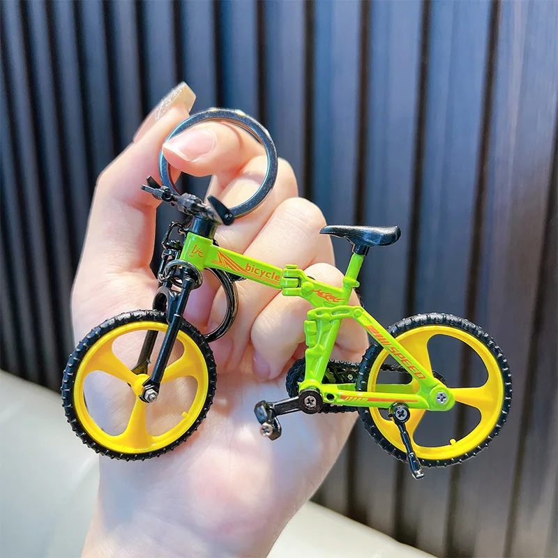 Portachiavi modello bici pieghevole Portachiavi in plastica Mini dito Pedale da montagna Borsa da bici Portachiavi pendente Giocattolo regalo per bambini Uomini Collezionista