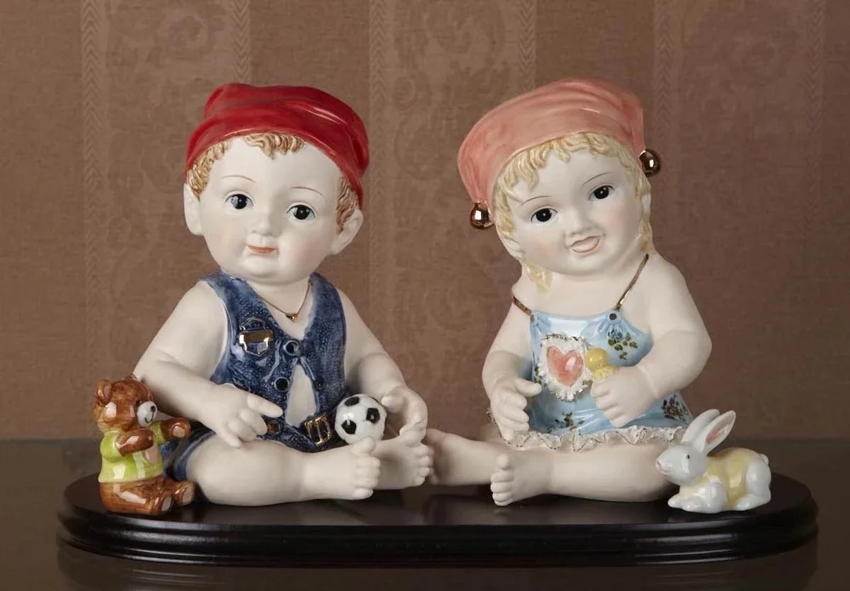 

Dragon and Phoenix Baby Porcelain Doll