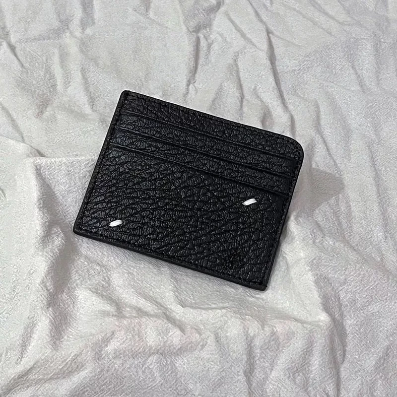 The first layer of cowhide multi-card change bag, men's and women's genuine leather black card bag, fashionable and simple wallet