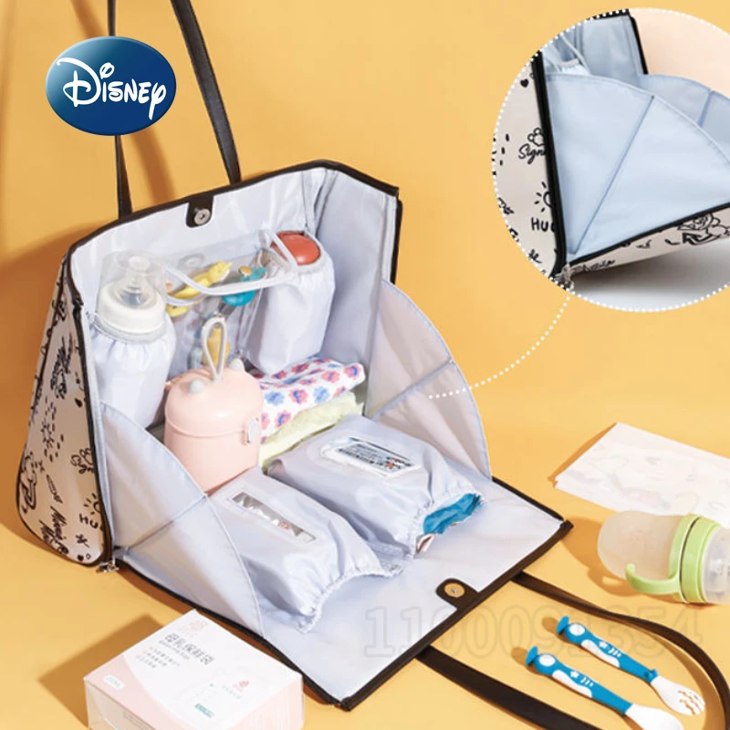 Disney-Bolsa de pañales de Mickey para bebé, bolso portátil Original de marca de lujo, bolso de pañales de moda de dibujos animados, multifuncional