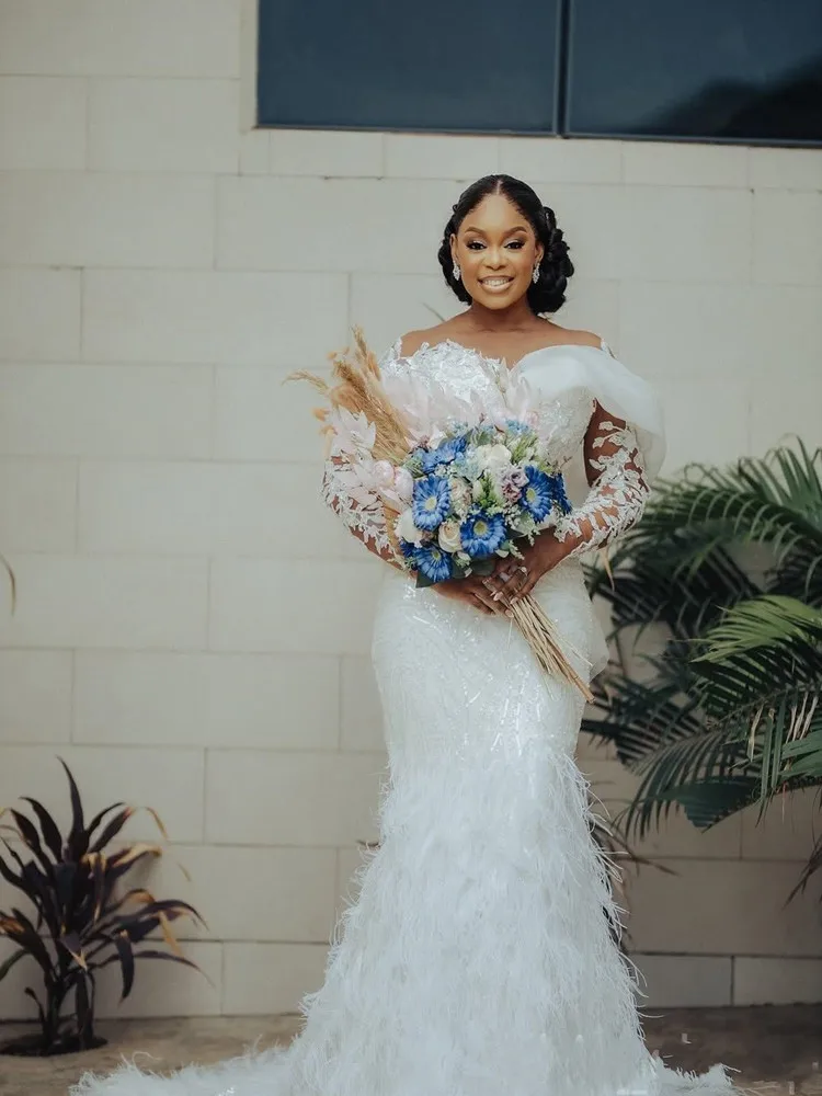 تخصيص خمر الدانتيل يزين حورية البحر فستان الزفاف Vestido De Casament طويلة الأكمام الفاخرة الريش زي العرائس