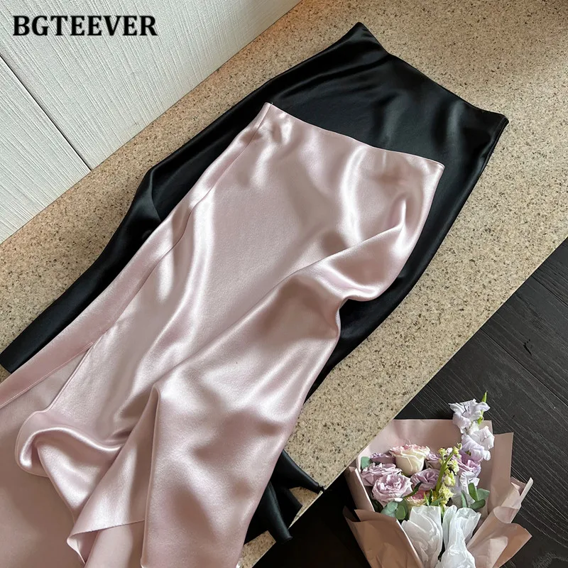BGTEEVER élégant côté fendu femmes jupes en Satin élégant taille haute dames paquet jupes de hanche printemps été