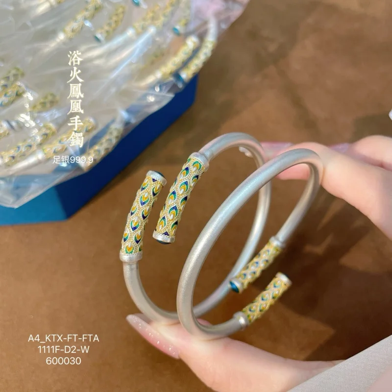 

Серебряный браслет 999.9 пробы с эмалью под старинное золото, открытый, элегантный