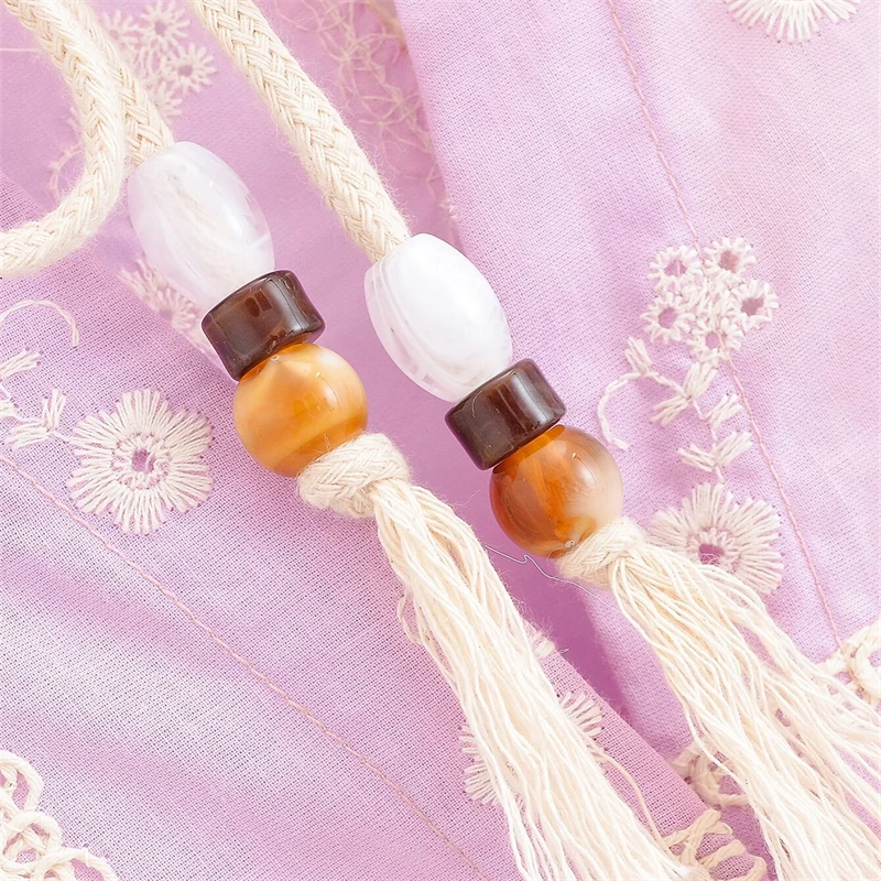 KEYANKETIAN خريف جديد المرأة الجولة الرقبة الرباط تعادل فانوس الأكمام جوفاء المطرزة قميص المرأة