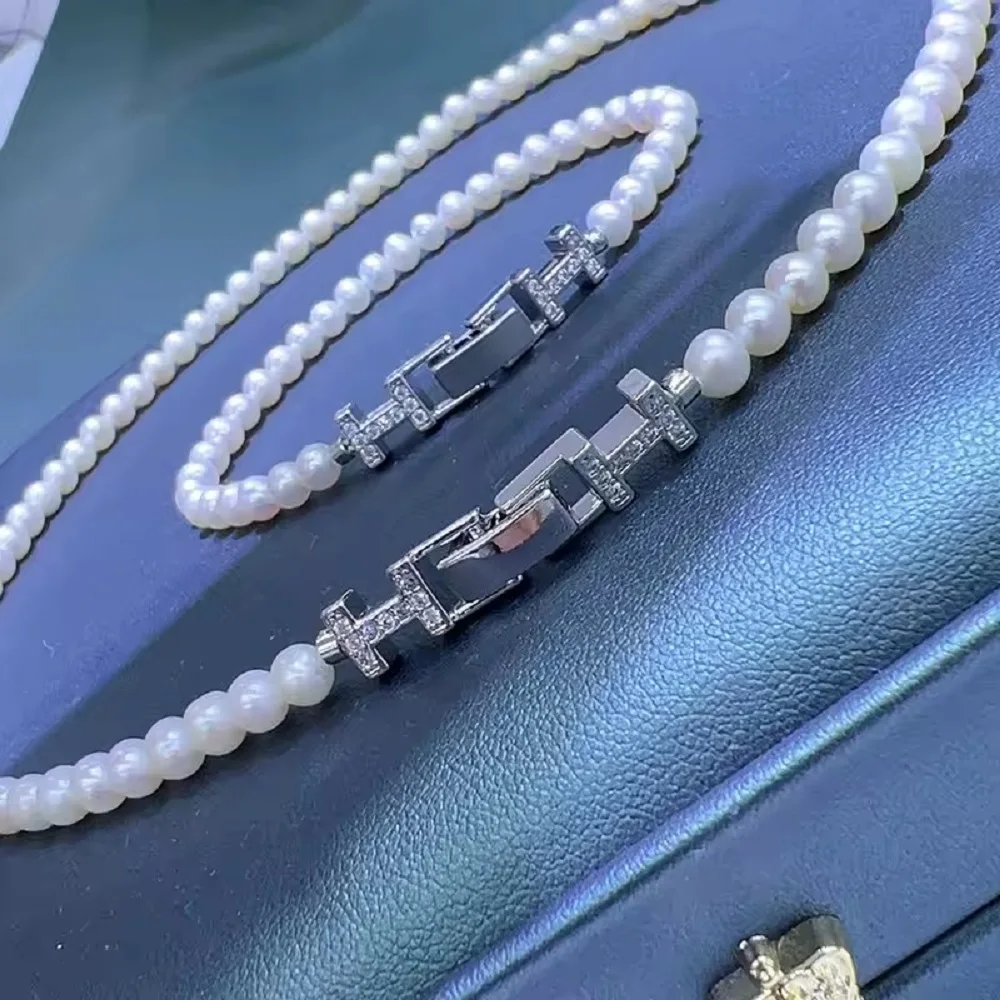 

Simple and elegant high-end necklace AAAA5-6mm natural white pearl necklace 18in+7.5-8in set 925s