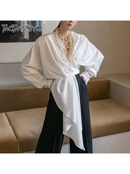 TWOTWINSTYLE Solid Asymmetrical Spliced Tassel Blouses For Women V Neck Long Sleeve Temperament Pullover Blouse Female Fashion