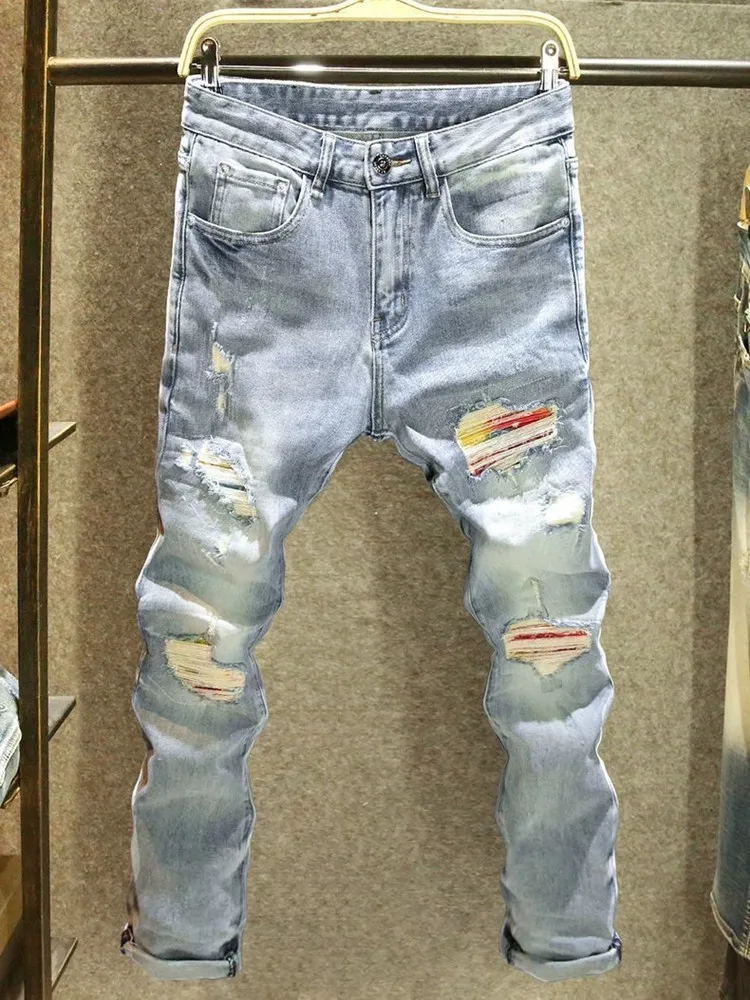 Jesienne i wiosenne modne jeansy męskie w jednolitym kolorze w stylu retro, z podarte prostymi nogawkami, wygodne, elastyczne, wysokiej jakości spodnie
