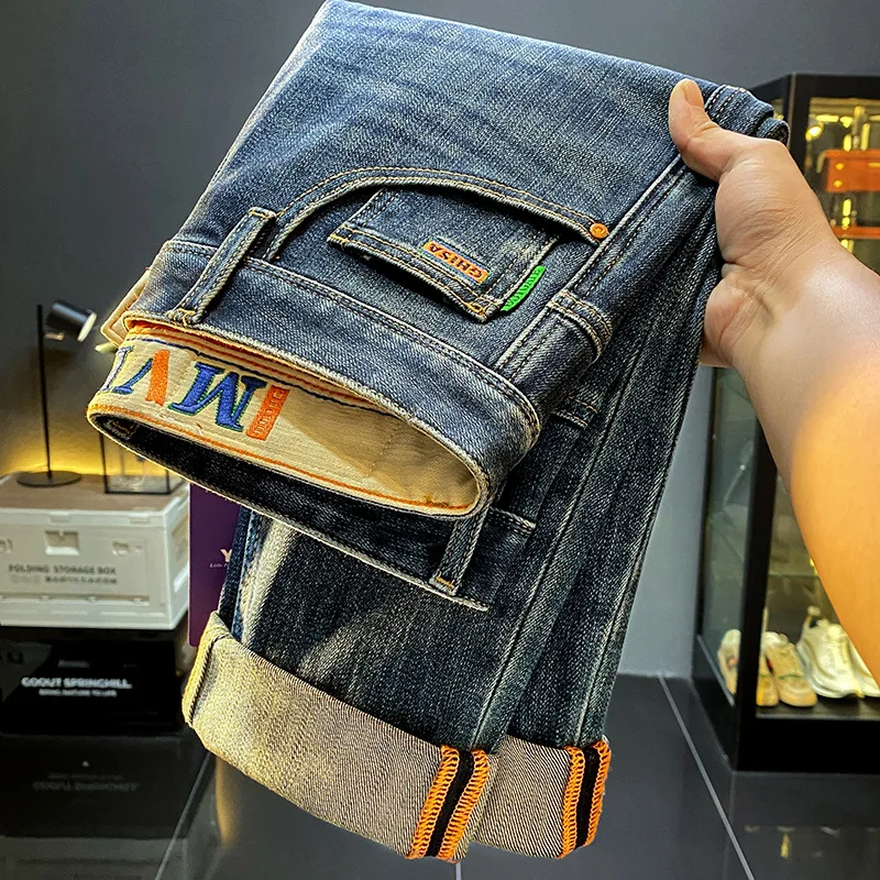 Celana jeans serbaguna pria, kasual klasik slim fit kaki lurus trendi baru musim gugur dan musim dingin 2024